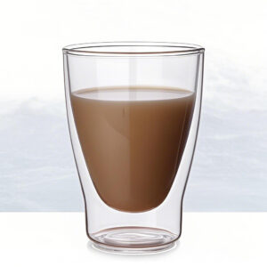 Set of two transparent double wall glass coffee cups on a white marble counter