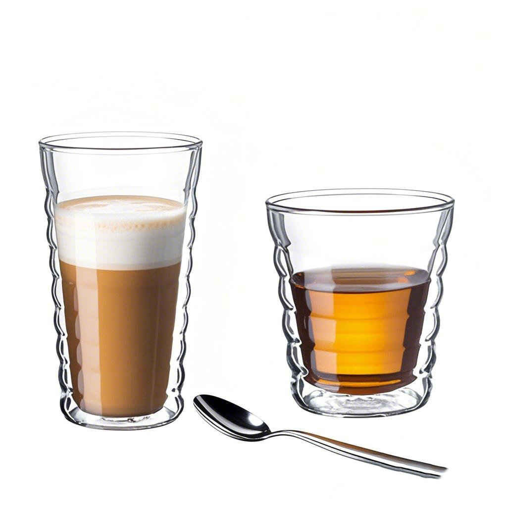 Double wall borosilicate glass cup for coffee, heat-resistant, clear glass, keeps drink warm without burning hands.