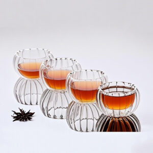 Specialty double wall glass cup with curved rim designed for tea tasting and aroma concentration